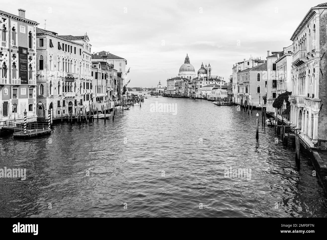 Venice, Italy - November 2022: Cityscape over Grand Canal; View from Academia Bridge overlooking the church of Saint Mary of Health, Santa Maria della Stock Photo