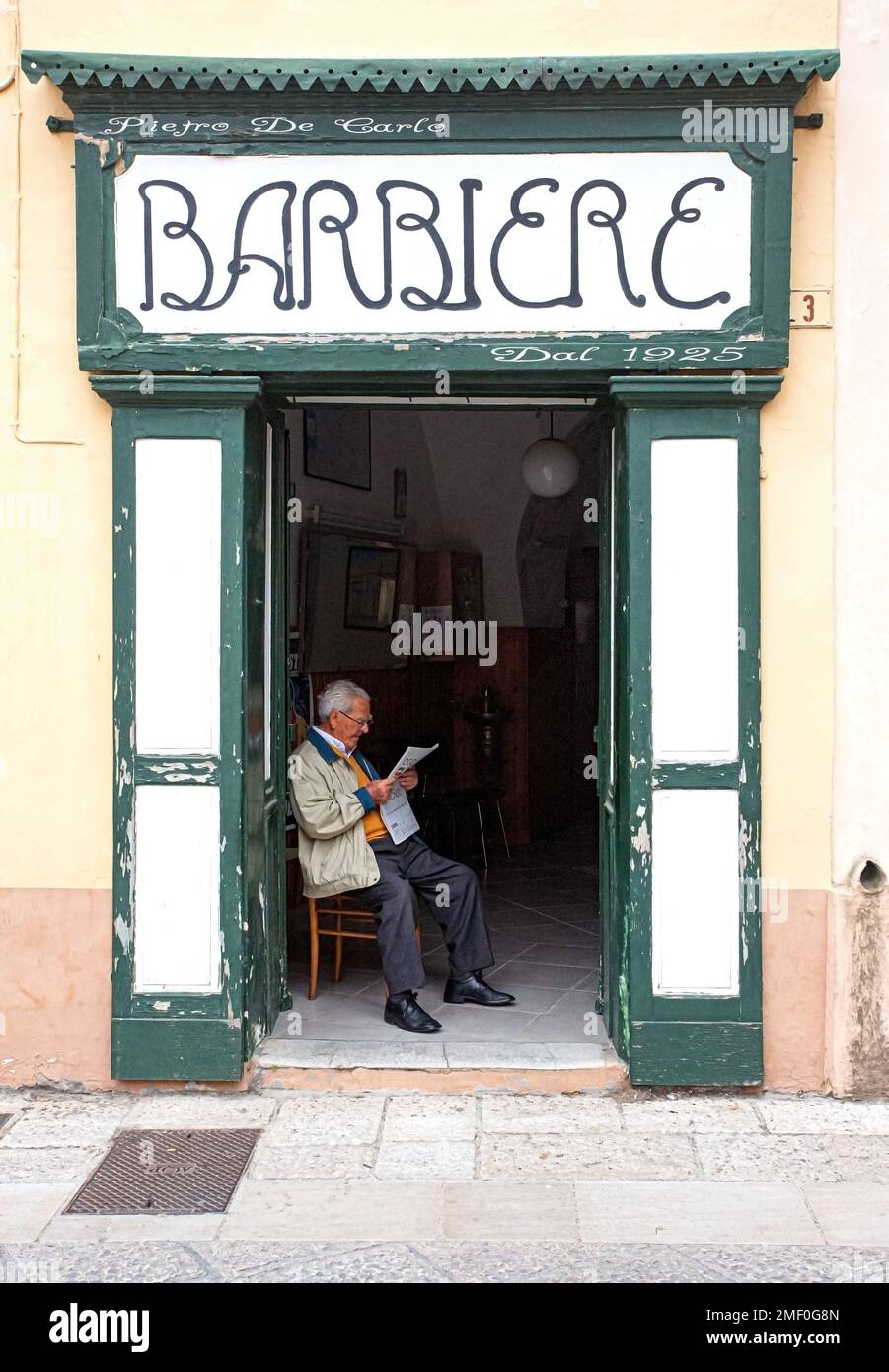 San Pietro in Lama, Italy, May 02, 2015 An old master sits at the door
