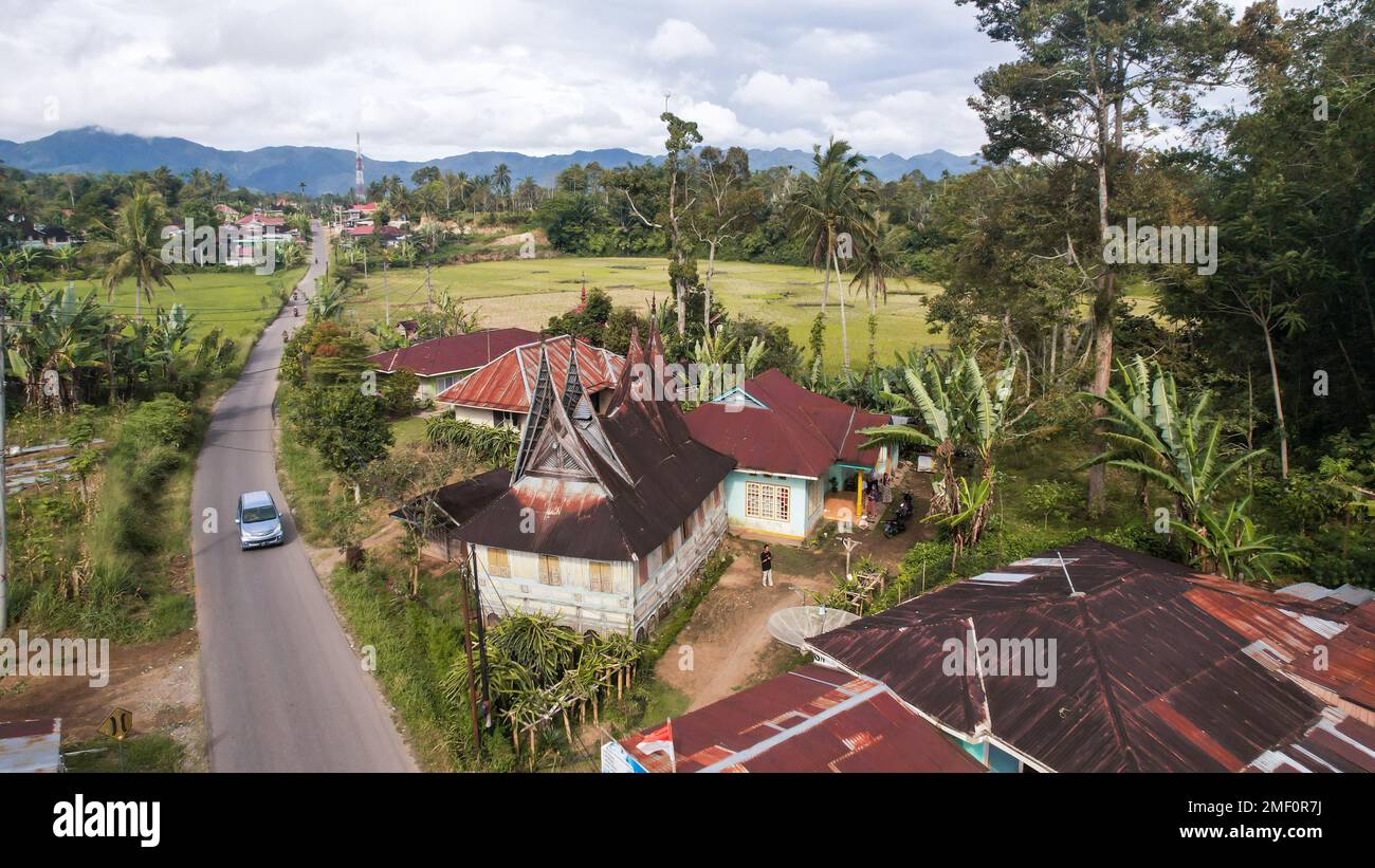 Aerial view of Traditional Minangkabau houses located in Bukittinggi, West Sumatra, Indonesia. Bukittinggi, Indonesia - January 25, 2023 Stock Photo