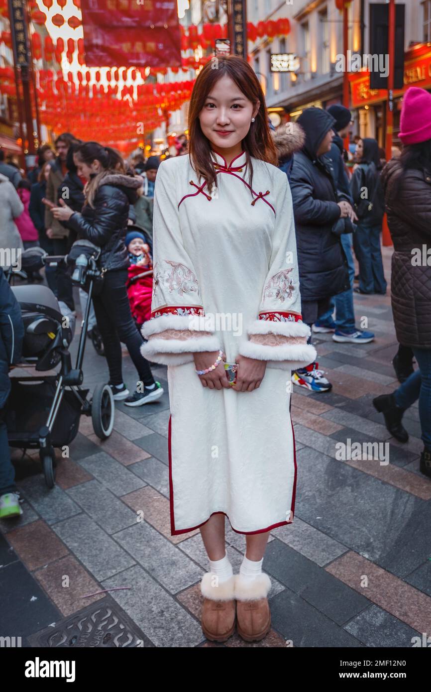 A chinese girl poses for a photograph in London's Chinatown during the celebration of the lunar new year. Stock Photo