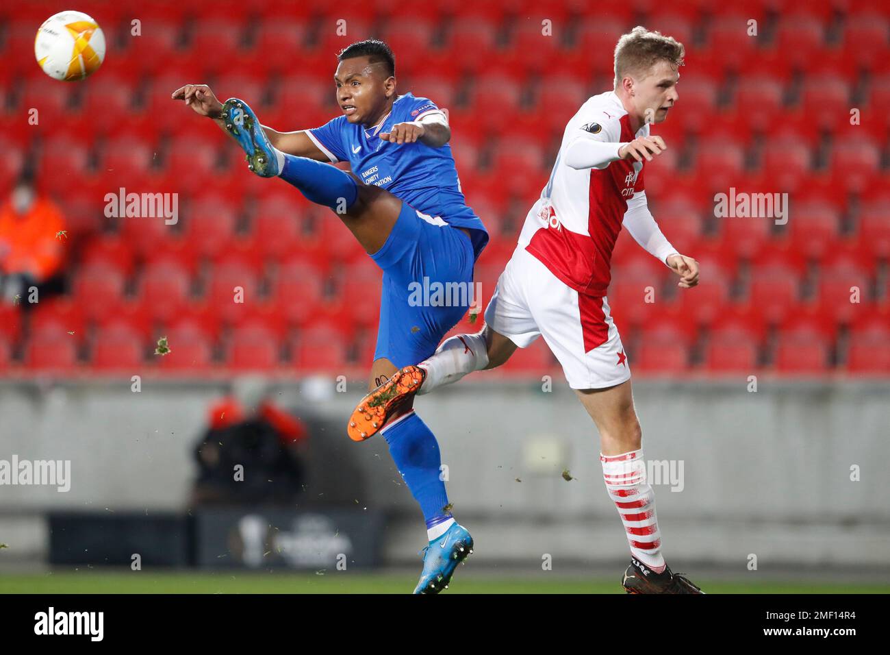Rangers' Alfredo Morelos, left, fights for the ball with Slavia's David Zima  during their UEFA Europa League round of 16 first leg soccer match between  Slavia Praha and Glasgow Rangers at the