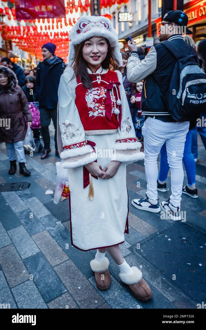 A chinese girl traditionally dressed in London's Chinatown during the celebration of the lunar new year. Stock Photo