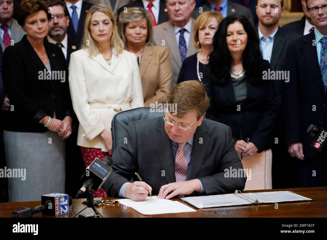 Mississippi Gov. Tate Reeves signs the first state bill in the U.S ...