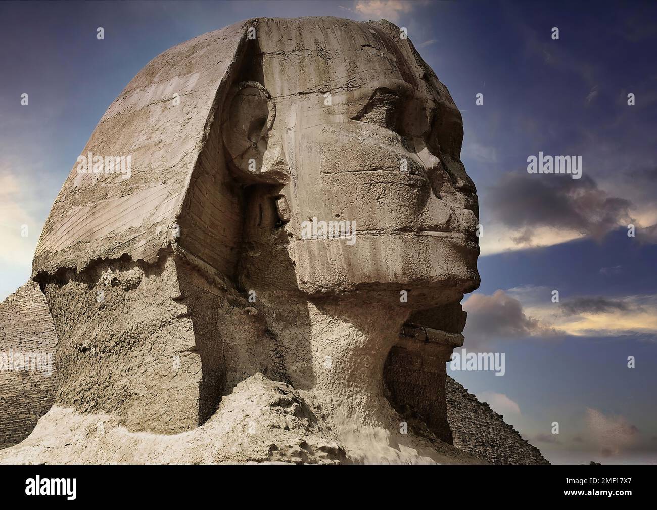 A striking close-up of the great sphinx of Giza (Cairo, Egypt) shrouded ...