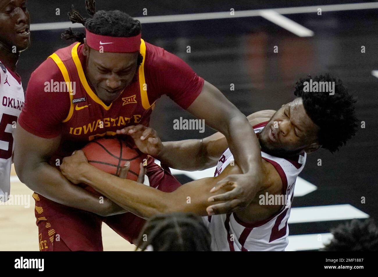 Iowa State forward Solomon Young, left, grabs a rebound against