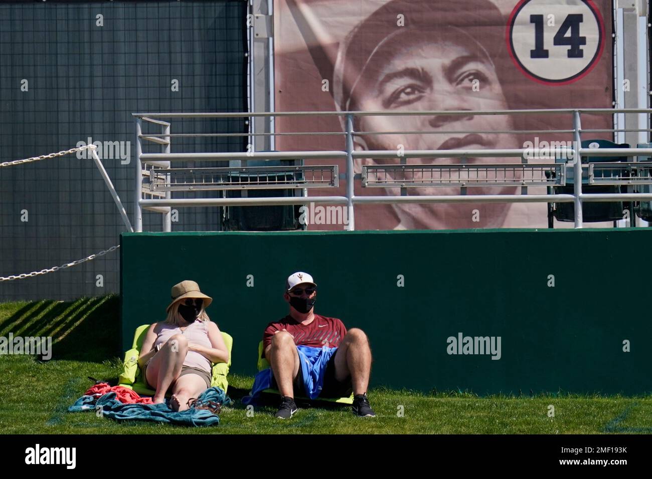 Baseball Hall of Fame inductee Larry Walker speaks as his girlfriend Donna  Szczepanski watches during an induction ceremony at the Clark Sports Center  on Wednesday, Sept. 8, 2021, in Cooperstown, N.Y. (AP