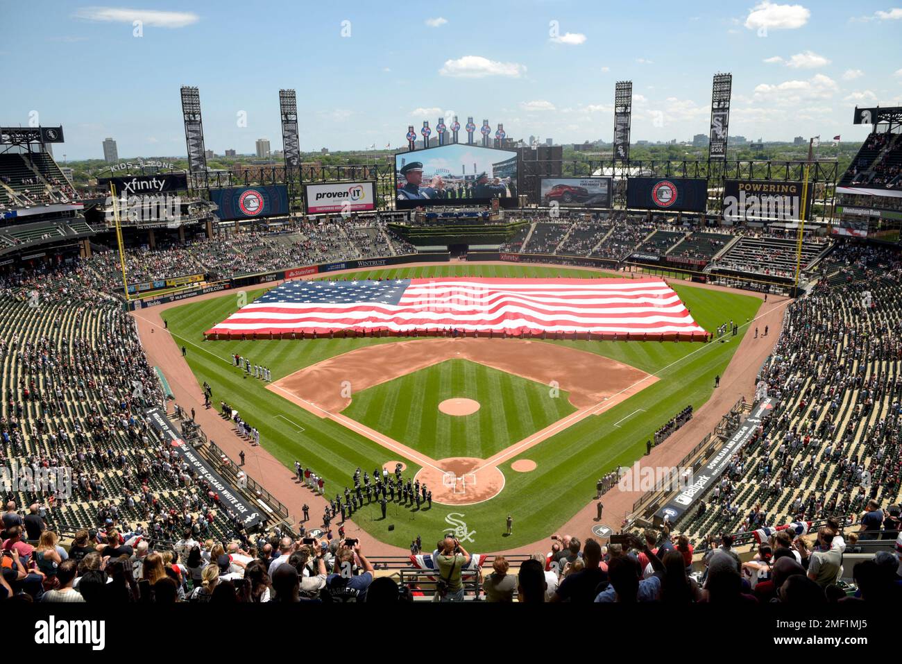 File:A giant American flag is unfurled at Wrigley Field before World Series  Game 3. (30010778984).jpg - Wikimedia Commons