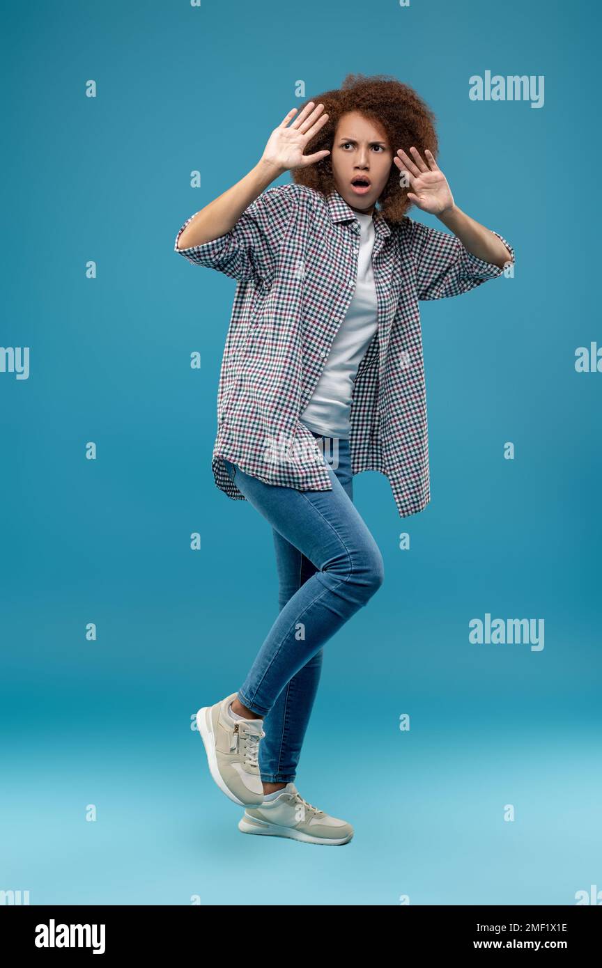 Woman running scared hi-res stock photography and images - Alamy