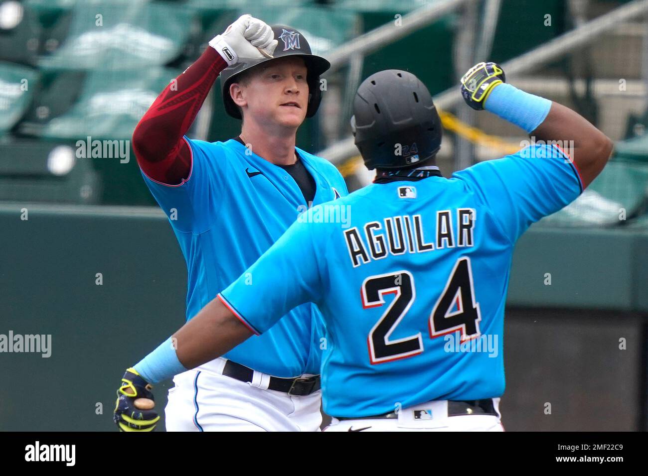 Miami Marlins' Garrett Cooper bats during a spring training baseball game  against the New York Mets, Monday, March 13, 2023, in Jupiter, Fla. (AP  Photo/Lynne Sladky Stock Photo - Alamy