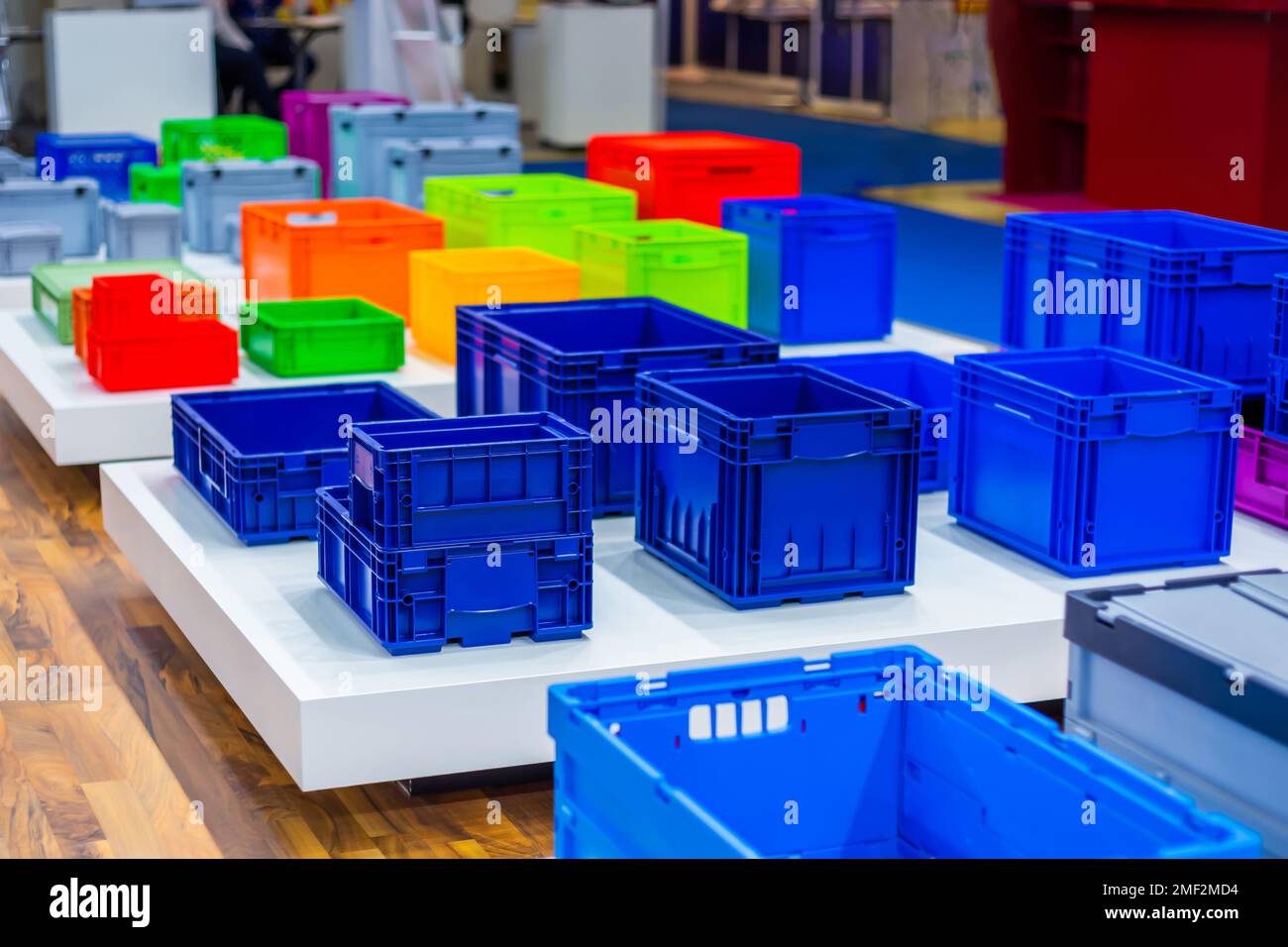 Many colorful plastic boxes, containers, crates at storage exhibition Stock Photo Alamy
