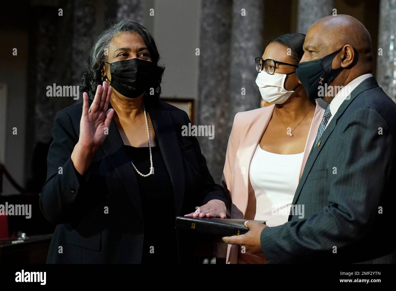 Sonceria Ann Berry, left, standing with her daughter Elizabeth Berry