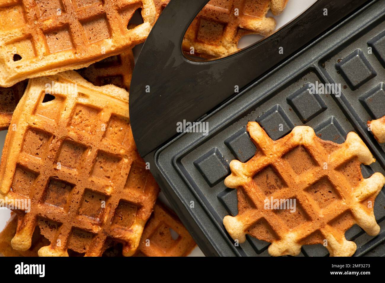 Crispy Thin Waffle Bowl Inside Iron Machine Stock Photo - Download Image  Now - Appliance, Baking, Batter - Food - iStock