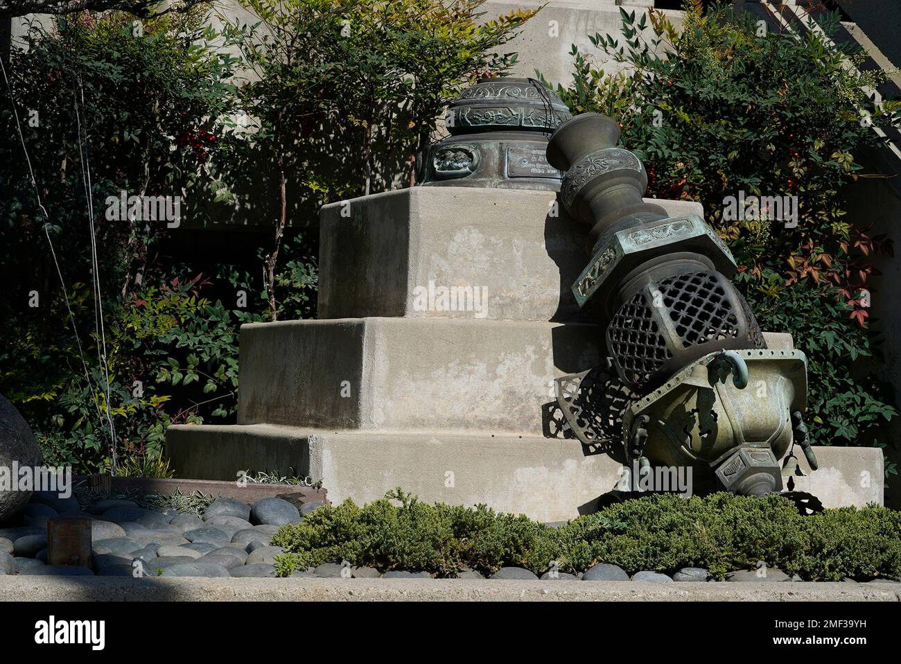 One of a pair of metal lanterns knocked down at the entrance of the