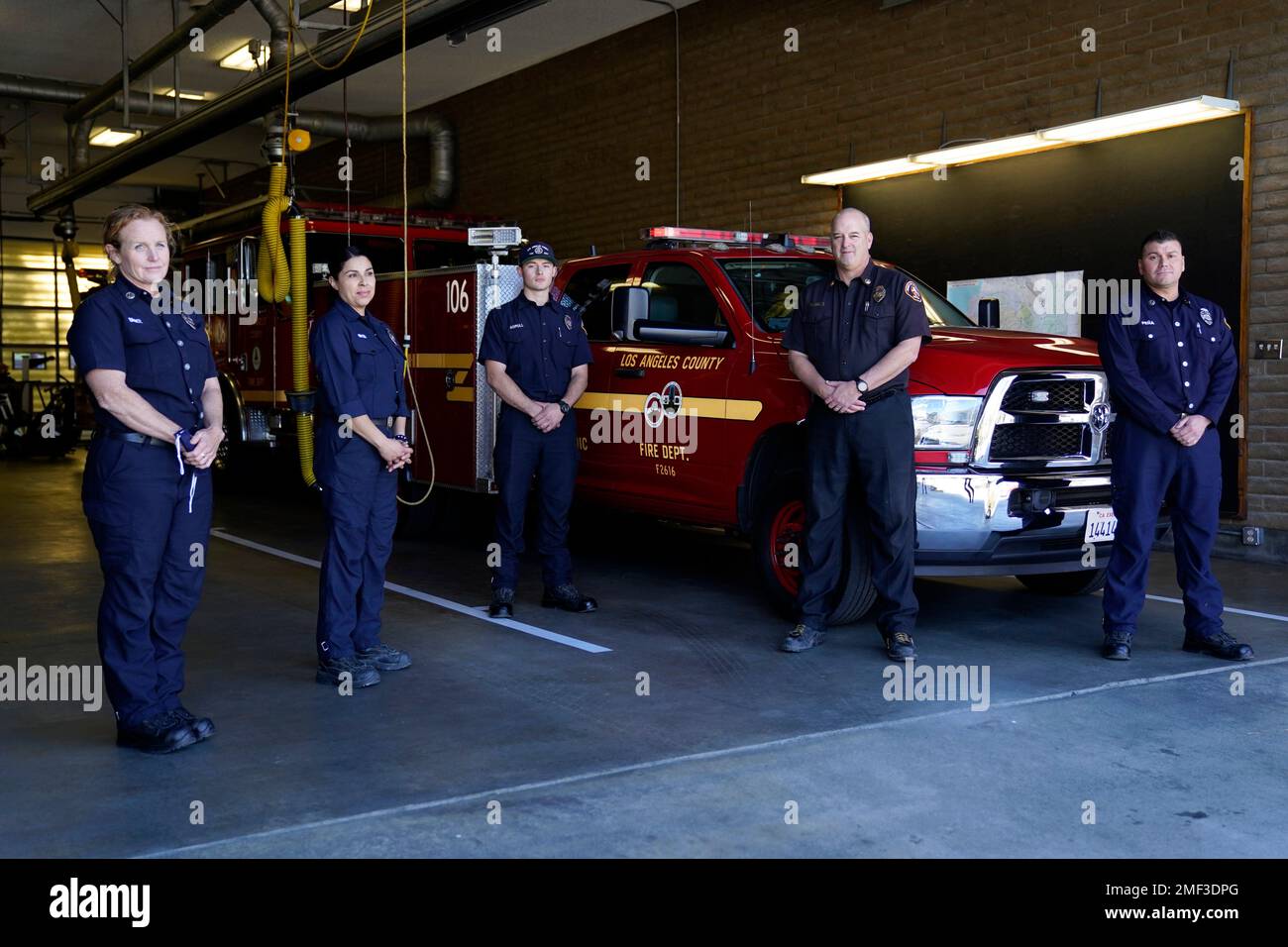 From left, fire Truck Captain Jeane Barrett, firefighter paramedic