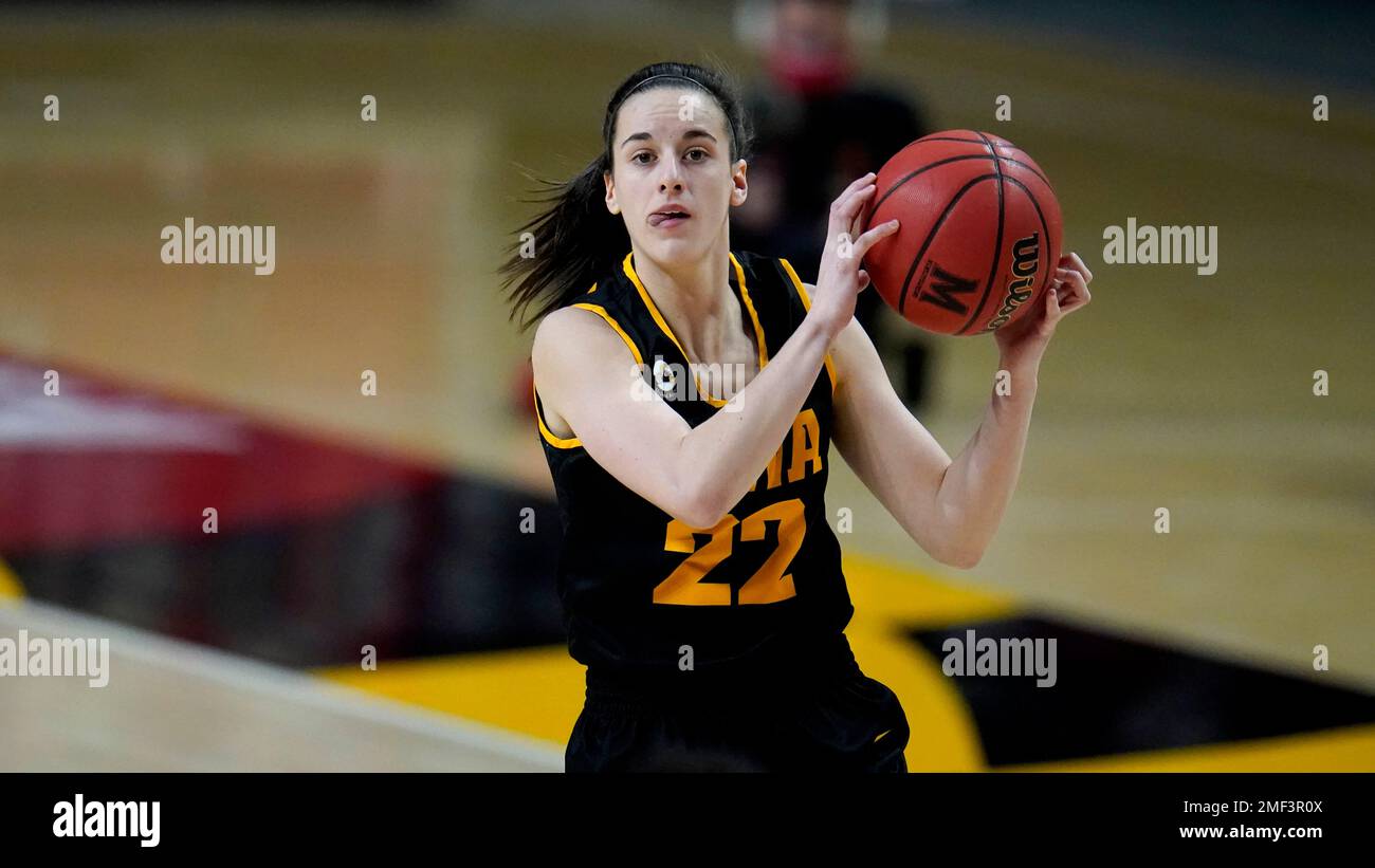 Iowa guard Caitlin Clark eyes the basket before shoots against Maryland  during the first half of an NCAA college basketball game, Tuesday, Feb. 23,  2021, in College Park, Md. (AP Photo/Julio Cortez