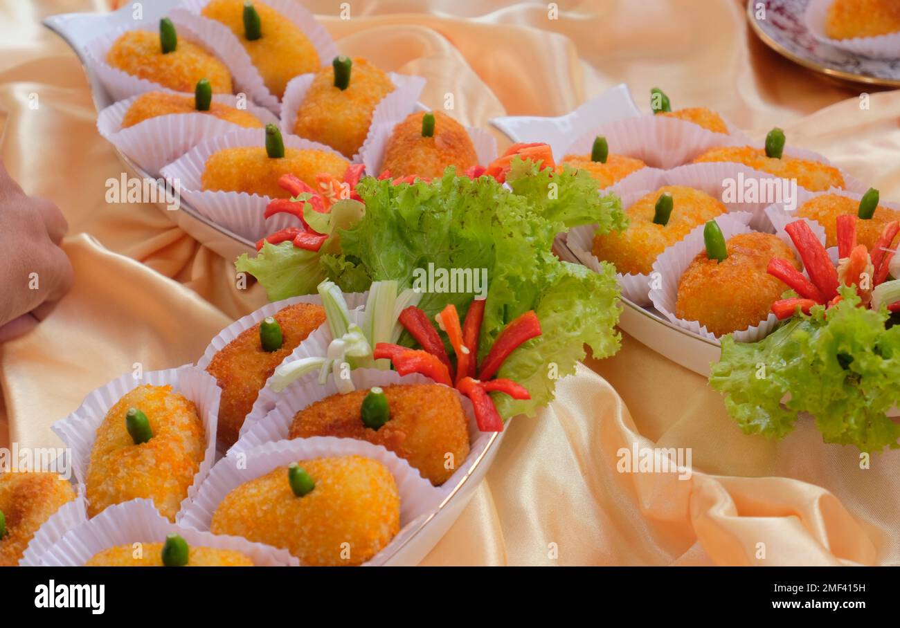 Kroket kentang is a traditional snack from Indonesia. served in wooden