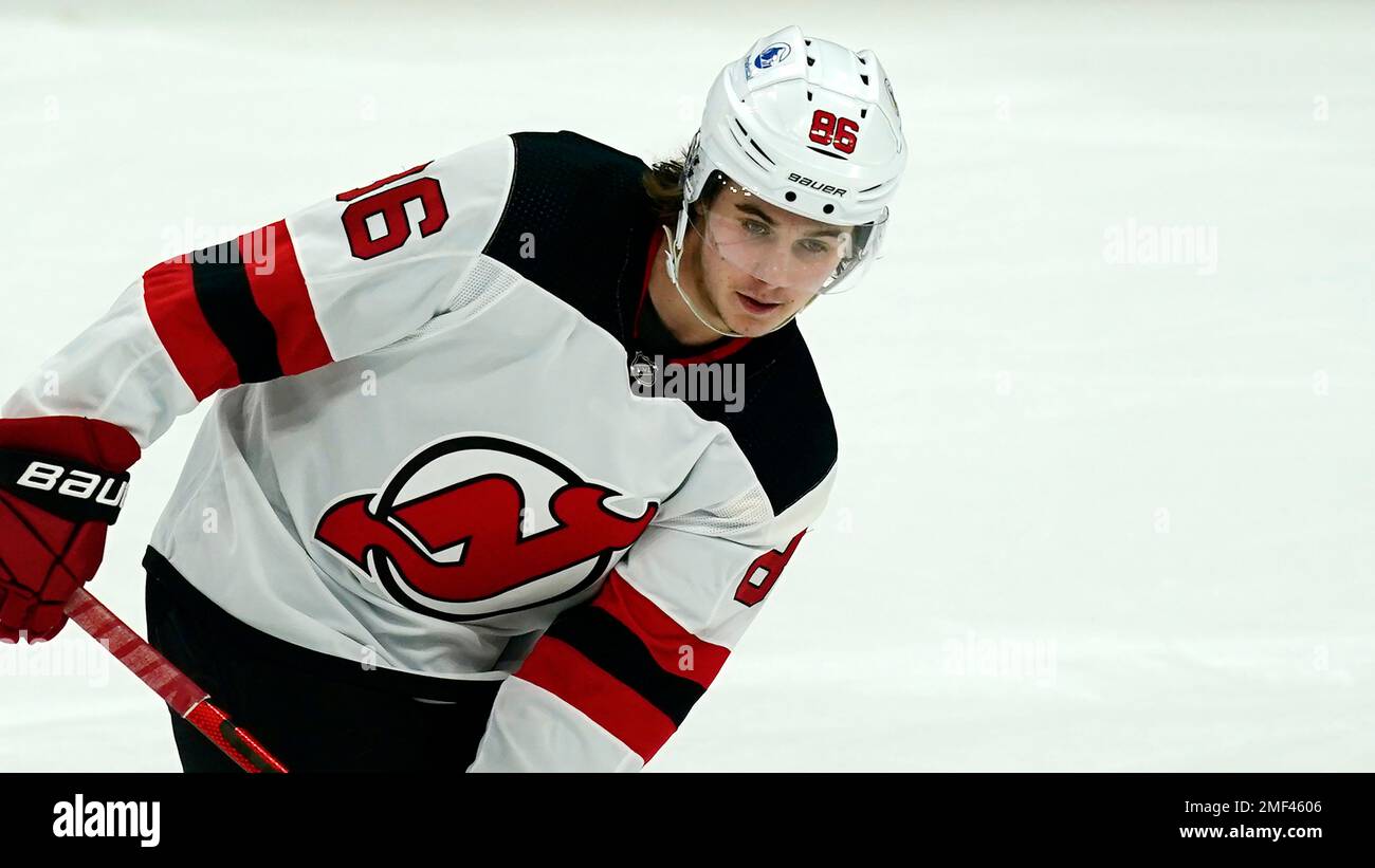 New Jersey Devils center Jack Hughes (86) celebrates scoring his first goal  in the third period in an NHL hockey game against the New York Rangers on  Tuesday, March 22, 2022, in