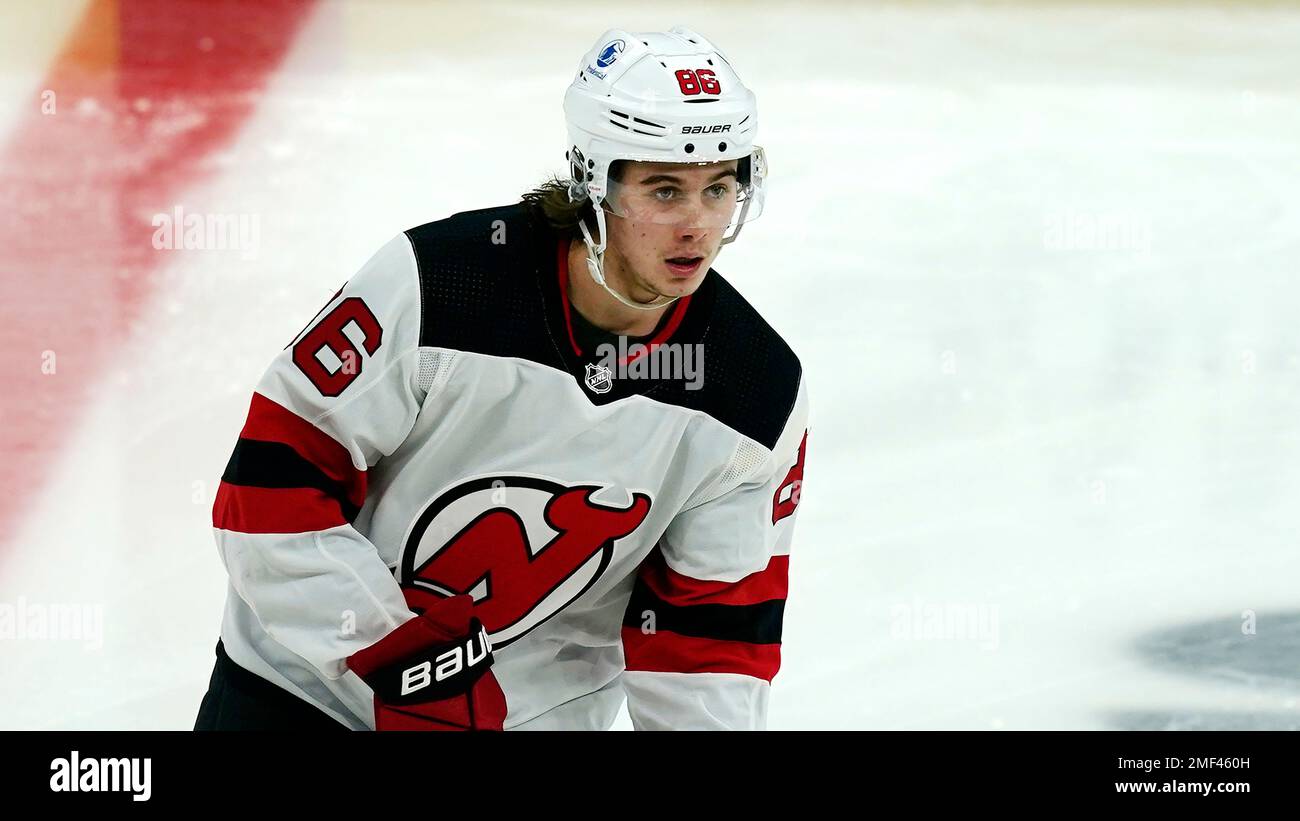 New Jersey Devils center Jack Hughes (86) celebrates scoring his first goal  in the third period in an NHL hockey game against the New York Rangers on  Tuesday, March 22, 2022, in