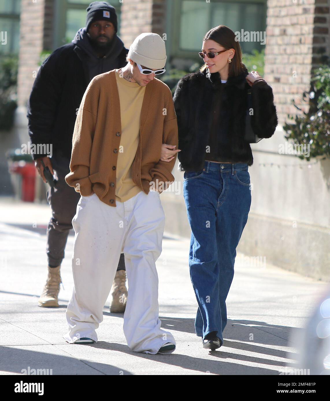 Singer Justin Bieber with his wife Hailey Bieber walking together to a