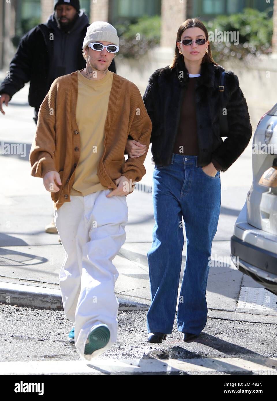 Singer Justin Bieber with his wife Hailey Bieber walking together to a