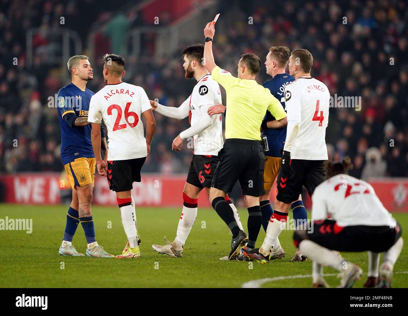 Referee Stuart Attwell shows a red card to Southampton's Duje Caleta-Car during the Carabao Cup semi-final first leg match at St. Mary's Stadium, Southampton. Picture date: Tuesday January 24, 2023. Stock Photo