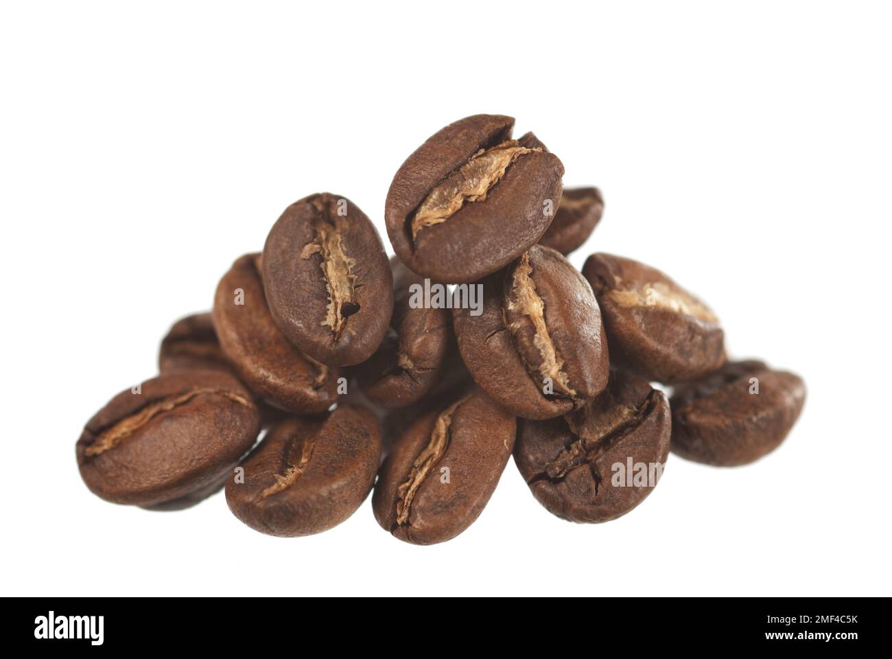 A pile of roasted coffee beans on white Stock Photo - Alamy