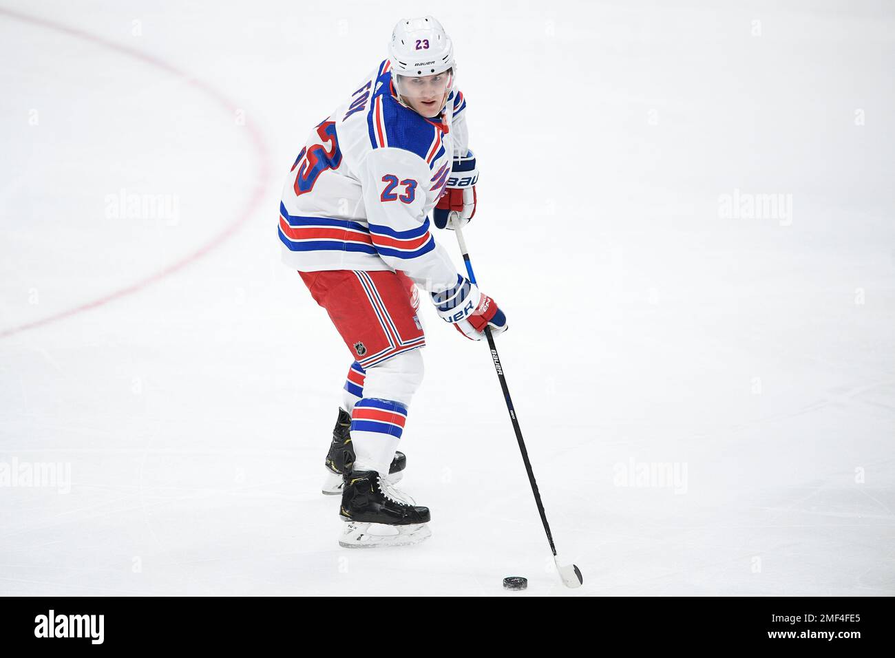 New York Rangers defenseman Adam Fox (23) waits for a face-off in the first  period of an NHL hockey game against the New Jersey Devils, Monday, Nov.  28, 2022, in New York. (