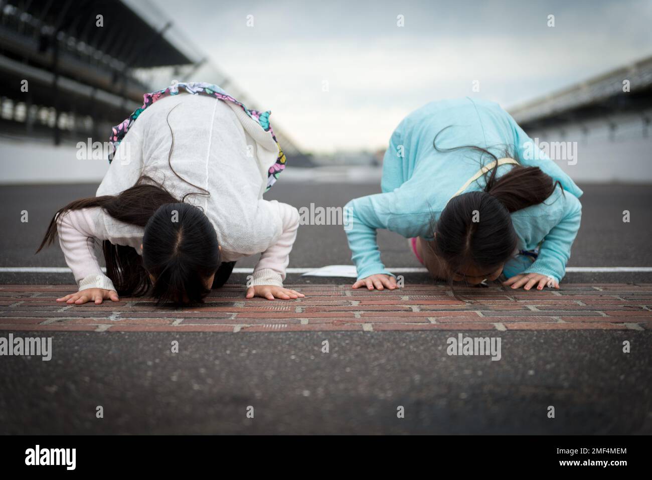 Kissing the brick at Indianapolis 500 race track Stock Photo