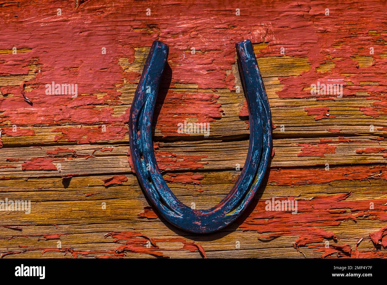 Lucky Horseshoe On Old Wooden Wall Stock Photo - Alamy