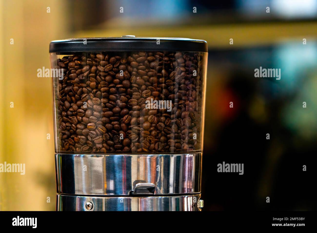 Coffee beans in the coffee grinder hopper Stock Photo Alamy