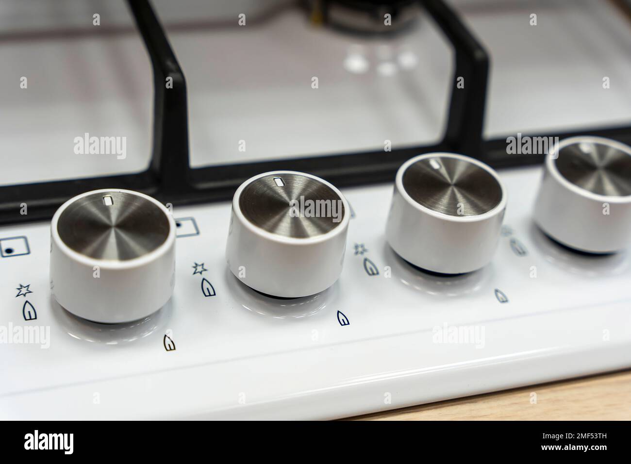 handle for turning on the burner of home kitchen stove. Home gas stove