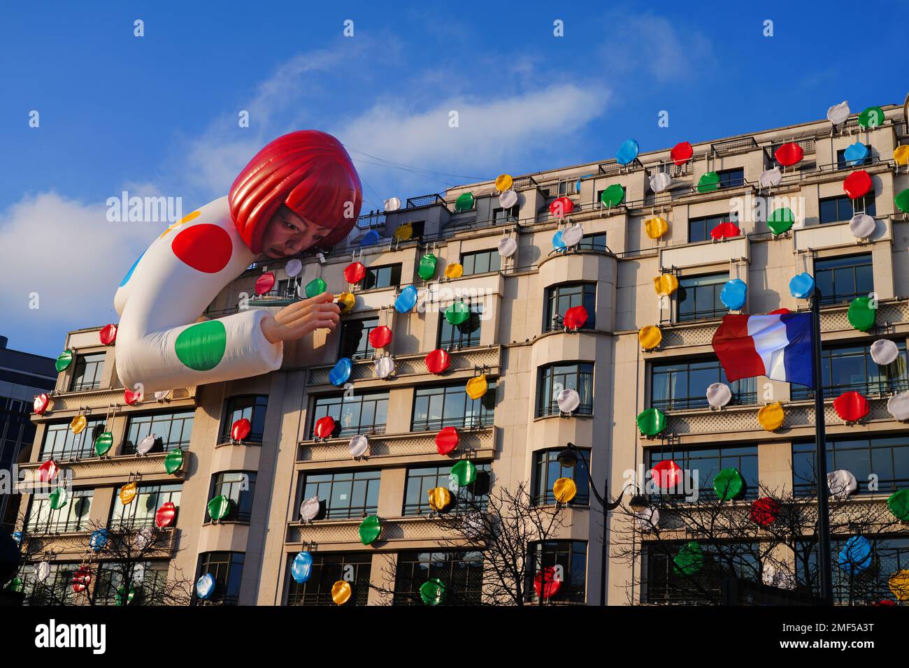 PARIS, FRANCE -22 JAN 2023- View of the Louis Vuitton flagship store on the  Champs-Elysees in Paris, France, covered with polka dots and a giant ballo  Stock Photo - Alamy