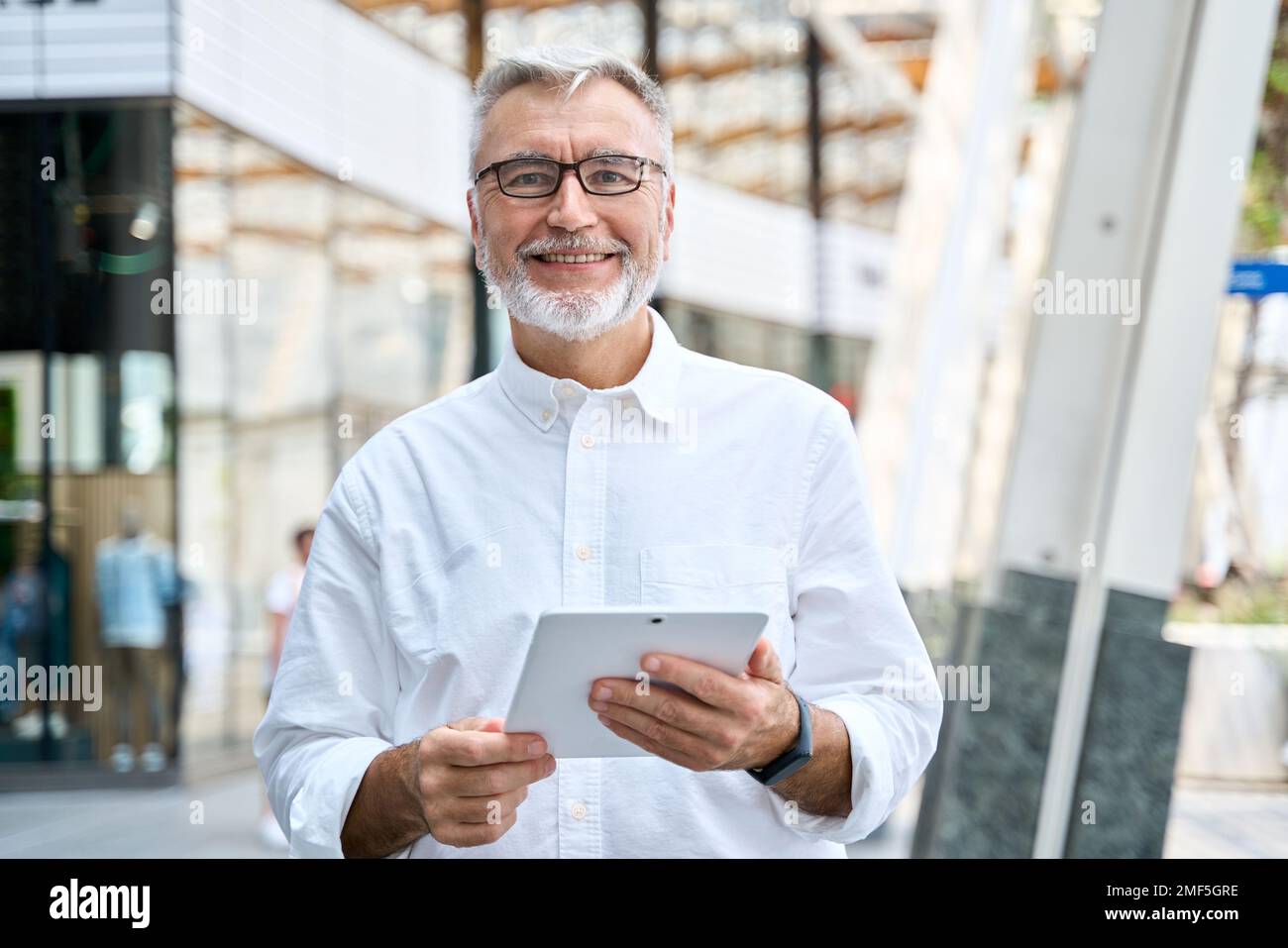 Senior mature older business man hi-res stock photography and images ...
