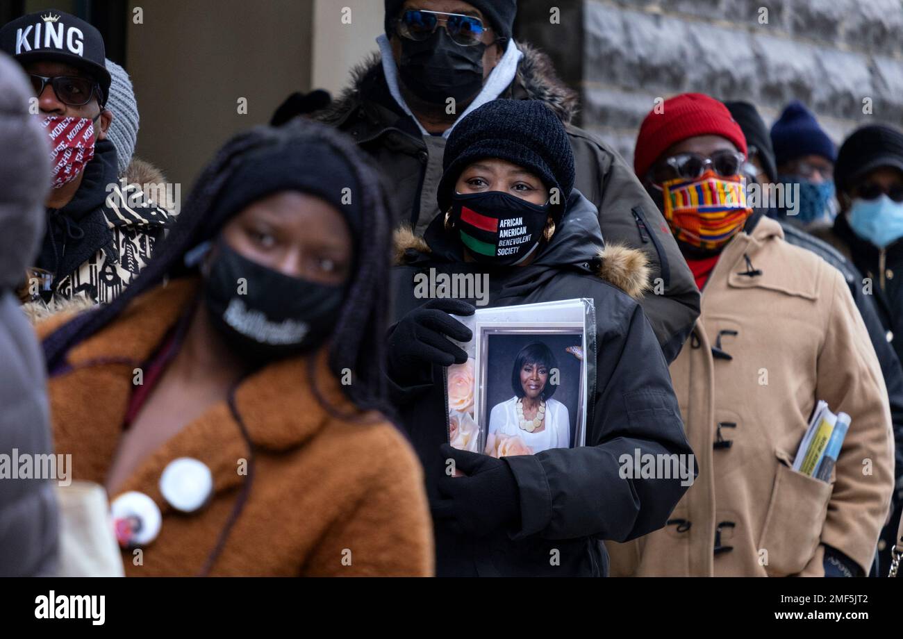 People wait on line to attend a public viewing for Cicely Tyson at the