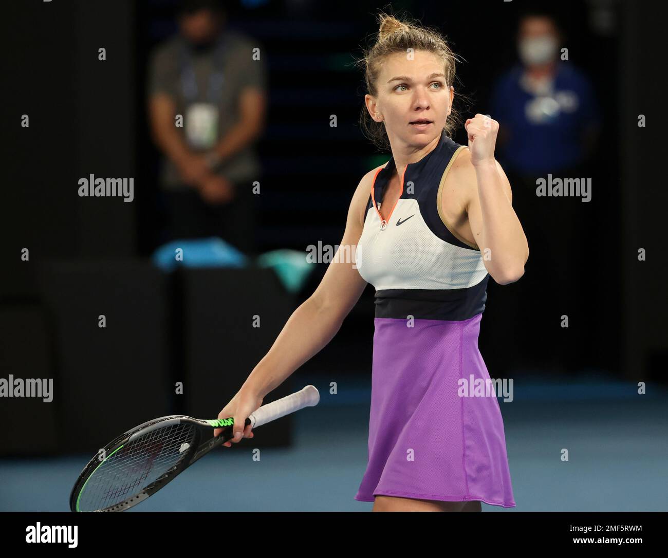 Romanias Simona Halep celebrates after defeating Polands Iga Swiatek in their fourth round match at the Australian Open tennis championship in Melbourne, Australia, Sunday, Feb