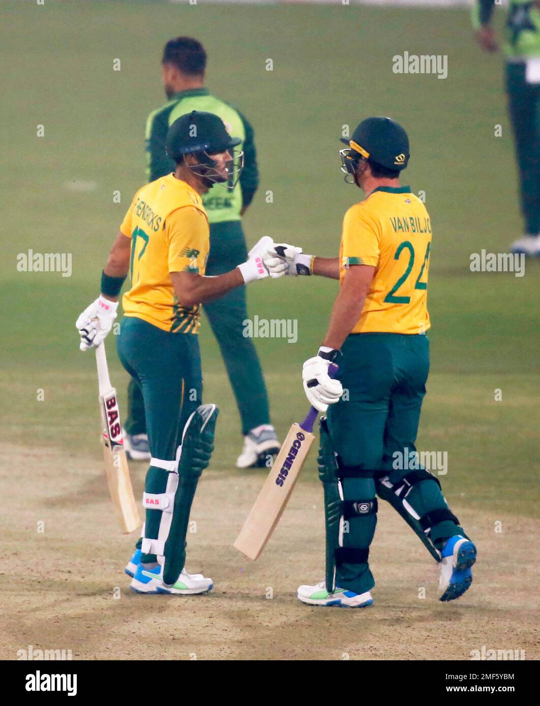 South Africa's Pite van Biljon, right, celebrates with teammate Reeza  Hendricks after hitting a boundary during the 2nd Twenty20 cricket match  between Pakistan and South Africa at the Gaddafi Stadium, in Lahore,