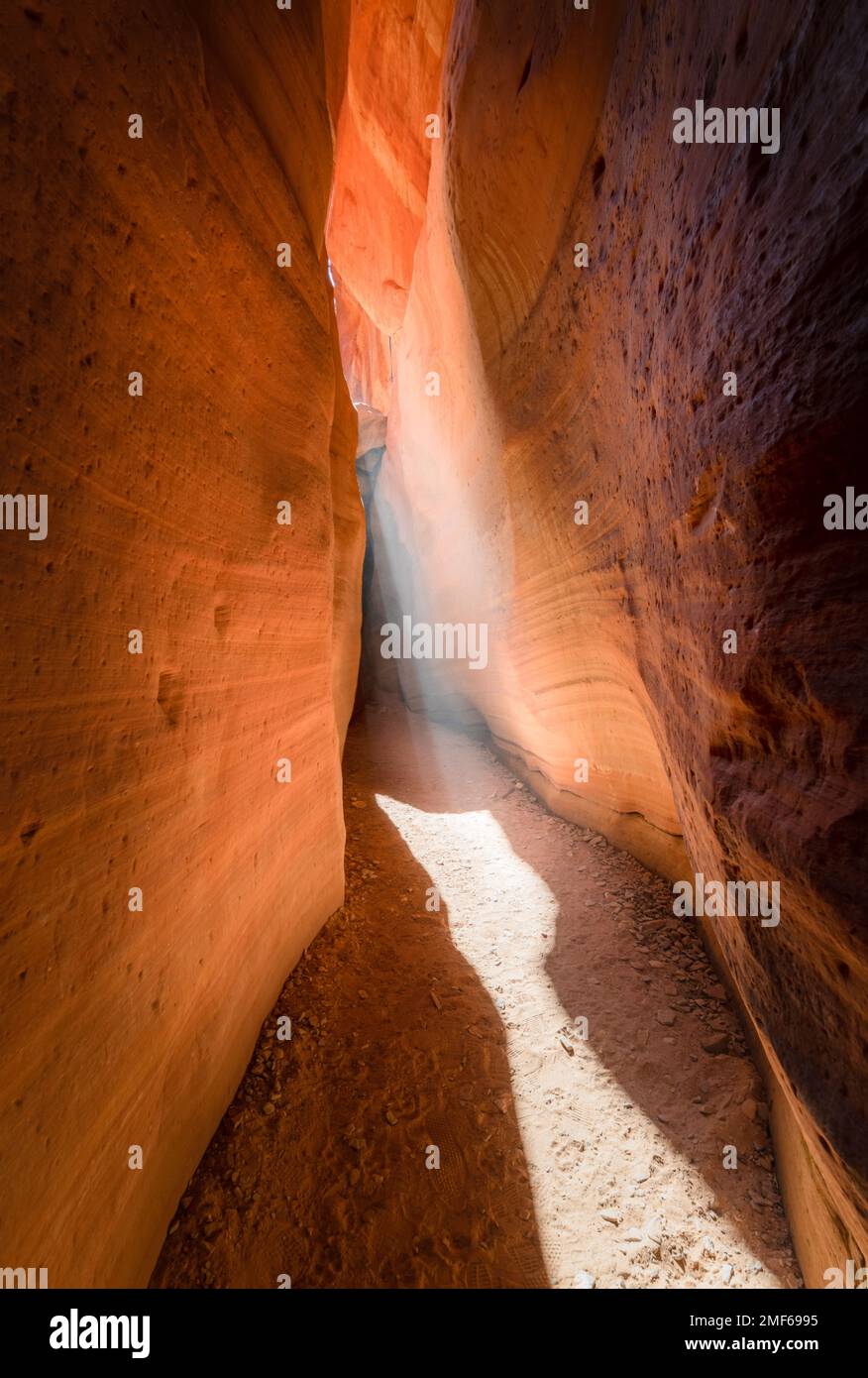 Southwest Nature Utah Outdoor AdventurePhotography Exploration in the Swirl of Sandstone in Peekaboo Slot Canyon Stock Photo