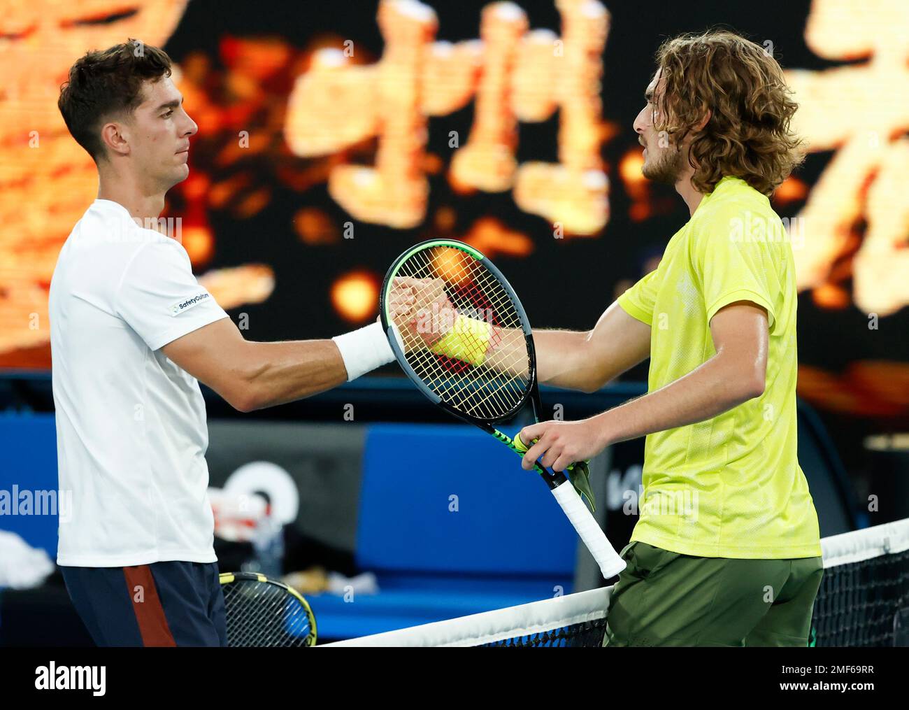 Greece's Stefanos Tsitsipas, right, is congratulated by Australia's ...