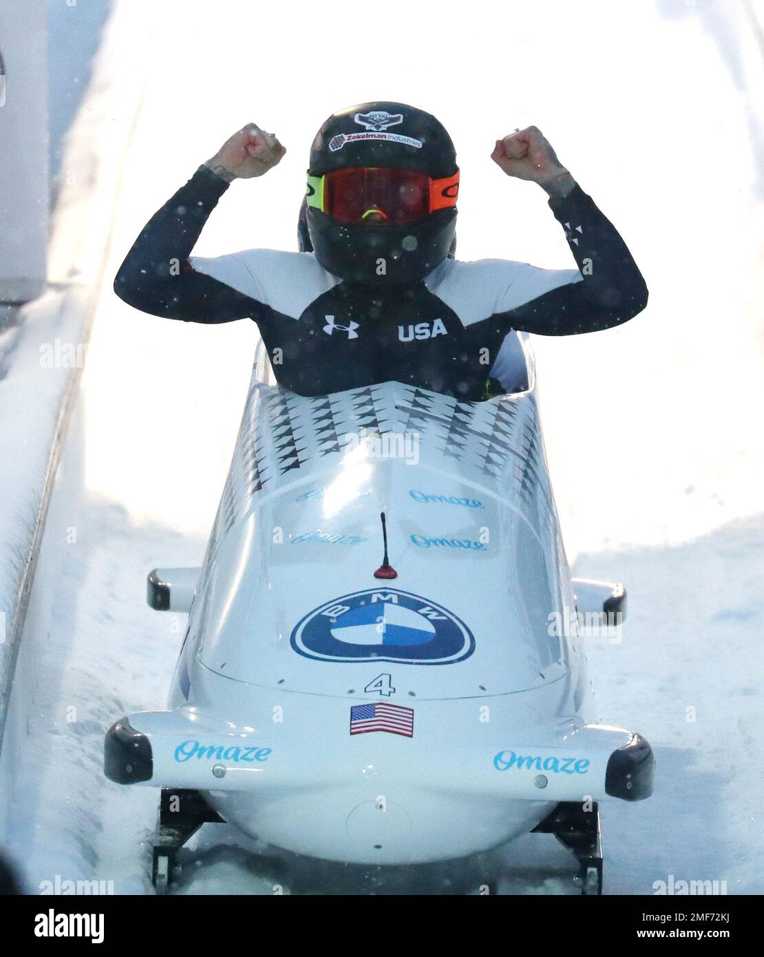 Kaillie Humphries and Lolo Jones of the United States celebrate after winning the two womens bobsleigh race at the Bobsleigh and Skeleton World Championships in Altenberg, Germany, Saturday, Feb