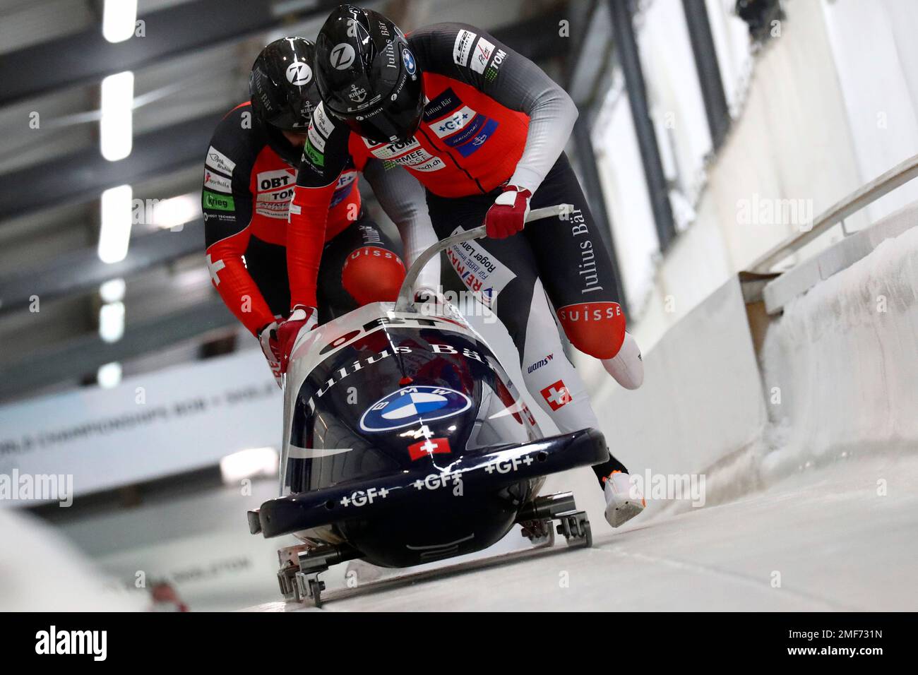 Michael Vogt and Sandro Michel of Switzerland start during the two mens bobsleigh race at the Bobsleigh and Skeleton World Championships in Altenberg, Germany, Saturday, Feb