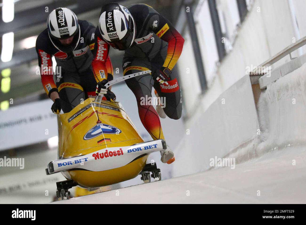 Hans Peter Hannighofer and Christian Roeder start during the two mens bobsleigh race at the Bobsleigh and Skeleton World Championships in Altenberg, Germany, Saturday, Feb