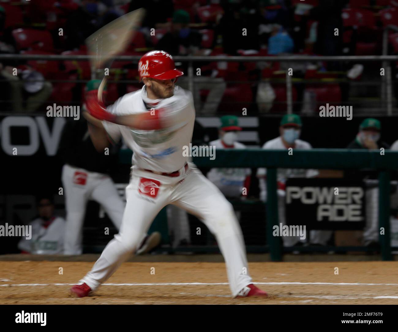 Mexico's Jesus Fabela swings and strikes out during the fifth inning of