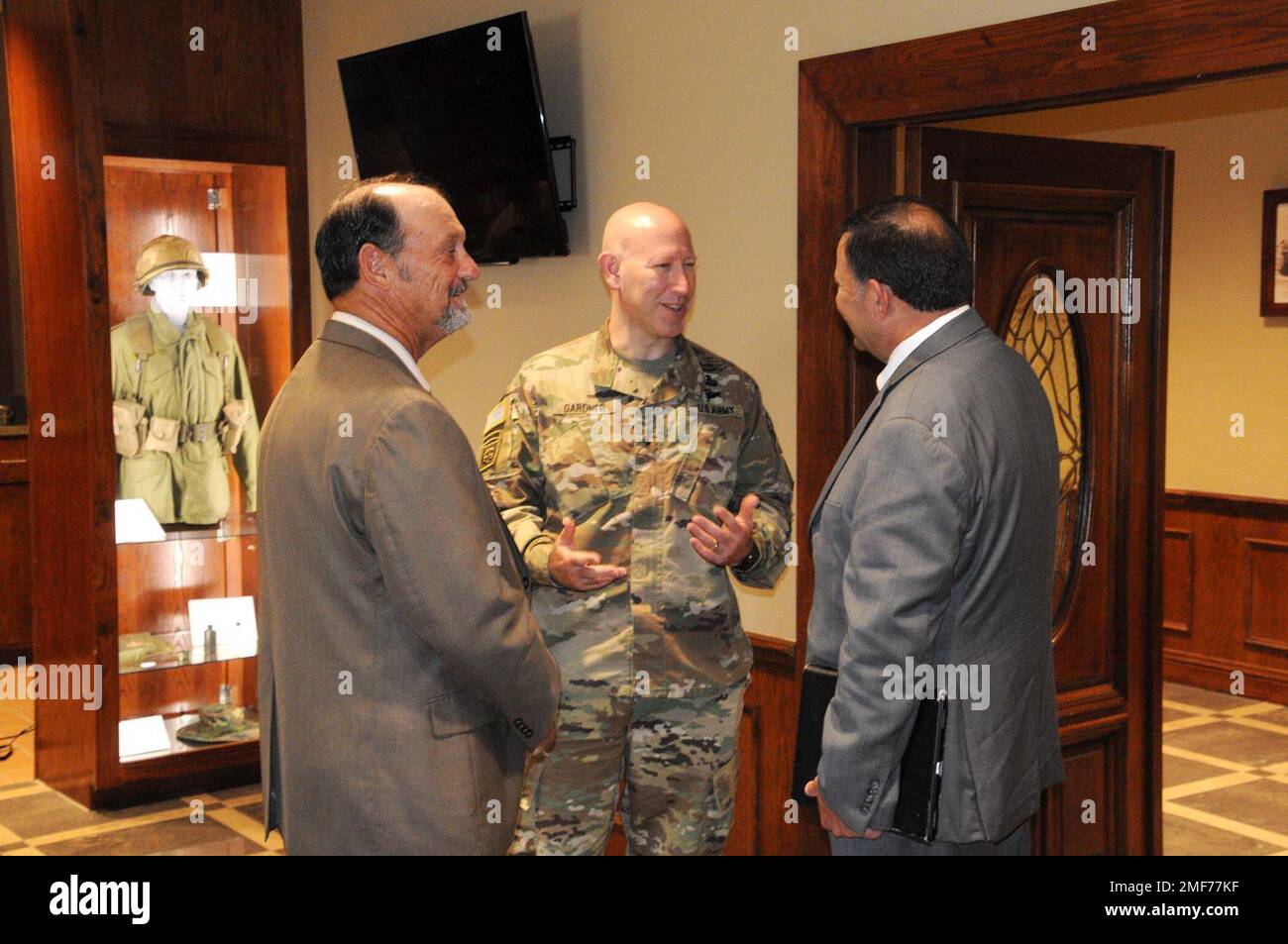 Brig. Gen. David W. Gardner, Joint Readiness Training Center and Fort Polk commanding general, (center) speaks with Rick Allen, Leesville mayor, (right) and Keith Lewing, Anacoco mayor, at a round table for area civic leaders held Aug. 17. Stock Photo