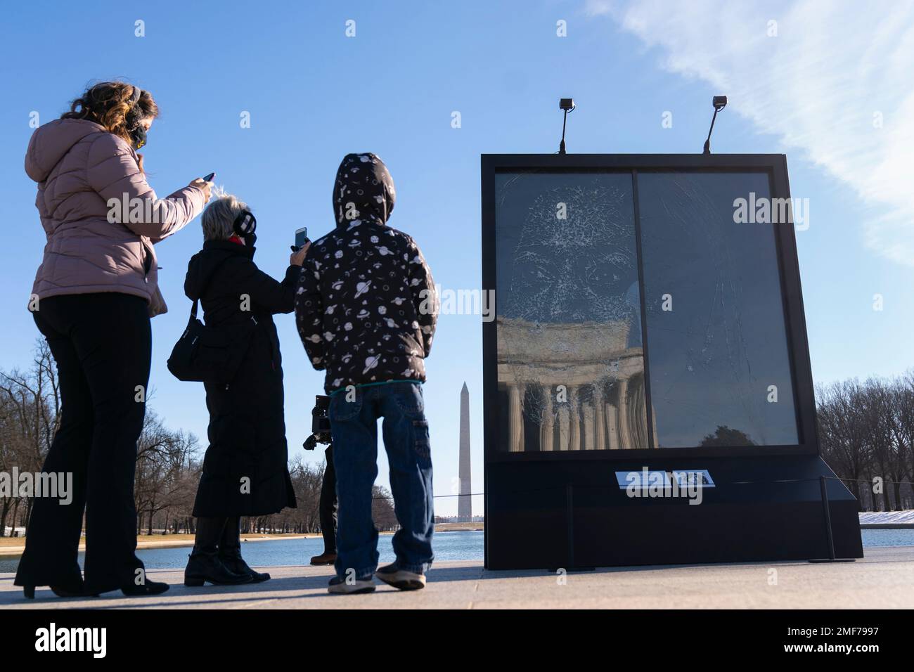 People photograph the installation Vice President Kamala Harris Glass  Ceiling Breaker at the Lincoln Memorial in Washington, Wednesday, Feb. 4,  2021. Vice President Kamala Harris' barrier-breaking career has been  memorialized in a
