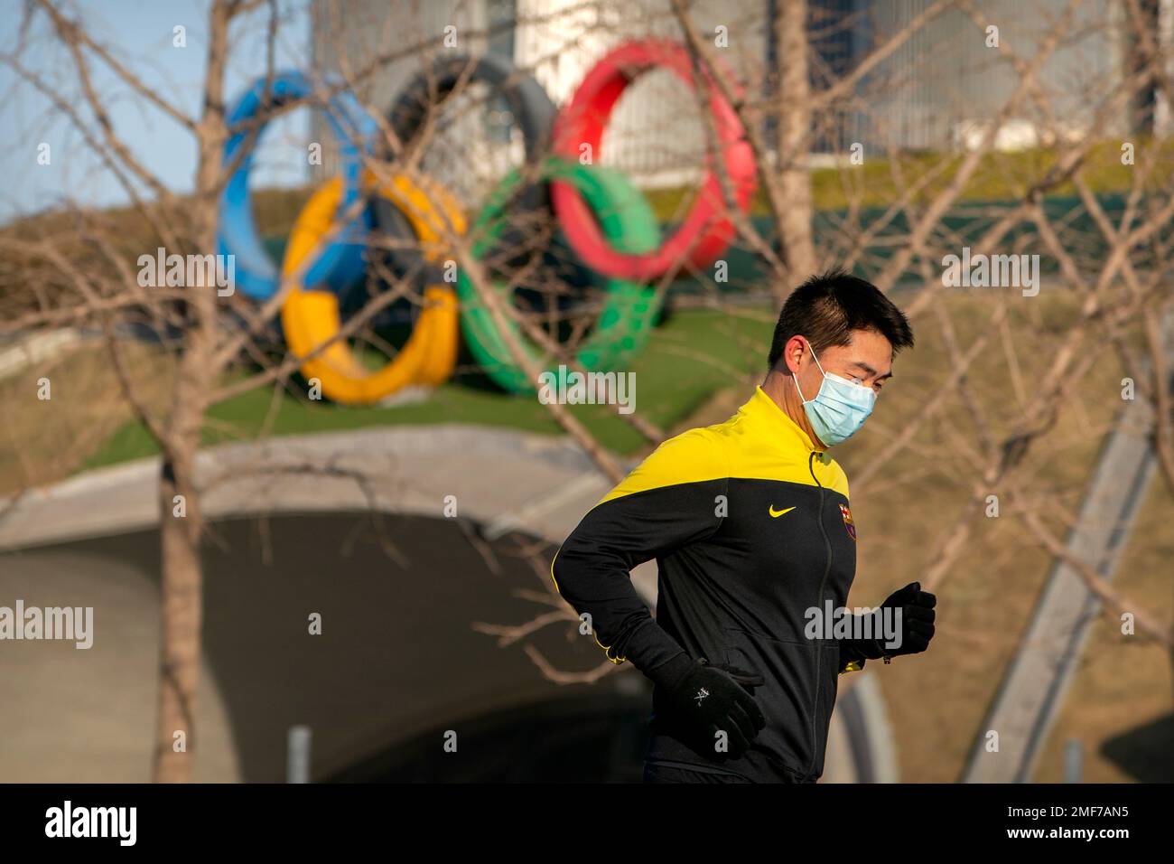 A Man Wearing A Face Mask To Protect Against The Spread Of The A man wearing a face mask to protect against the spread of the