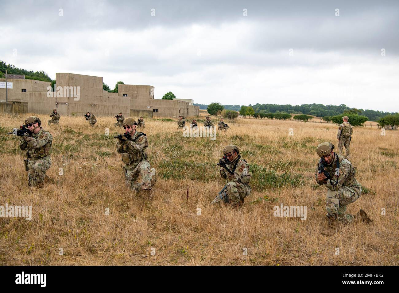 Airmen from the 423d Security Forces Squadron hold a formation during a field training exercise at Stanford Training Area, England, Aug. 17, 2022. Instructors from the 820th Base Defense Group and 435th Security Forces Squadron Ground Combat Readiness Training Center, conducted the exercise to evaluate and bolster the combat readiness skills of the defenders from the 423d SFS. Stock Photo