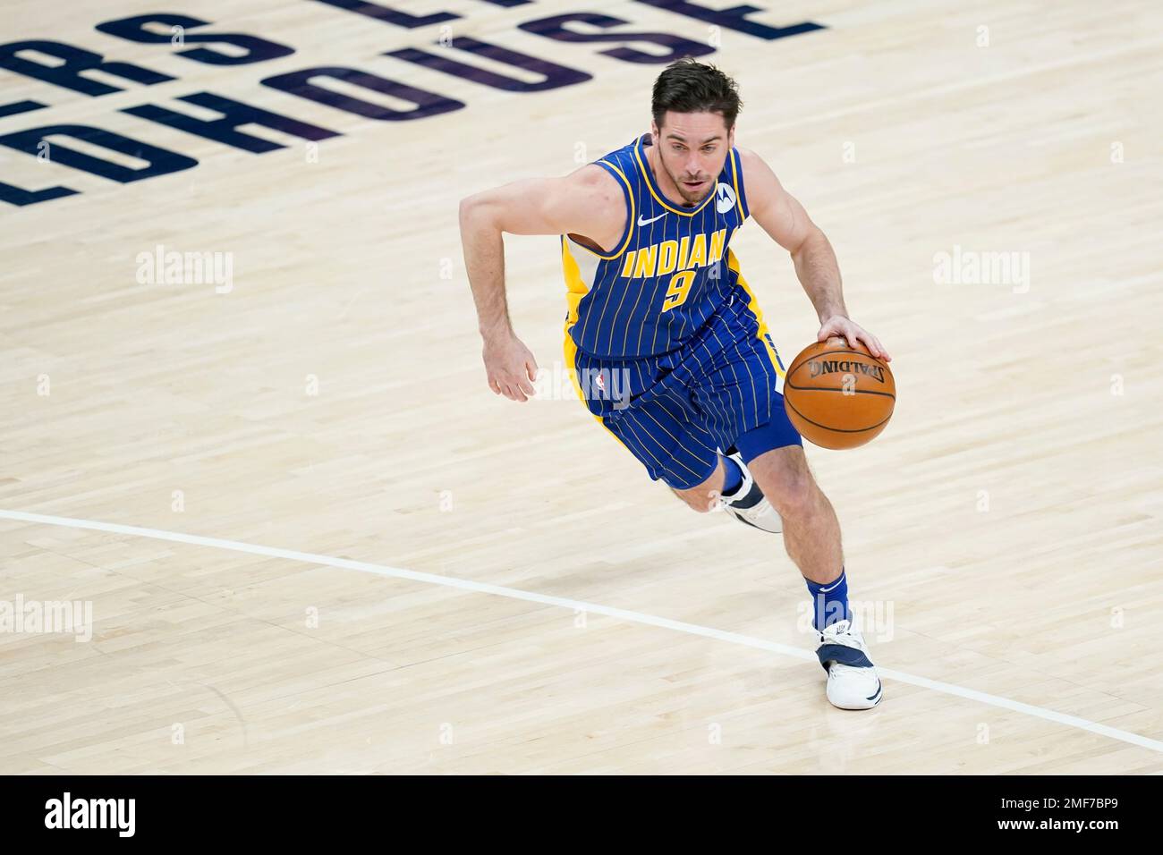 Indiana Pacers' T.J. McConnell (9) Dribbles During The First Half Of An ...