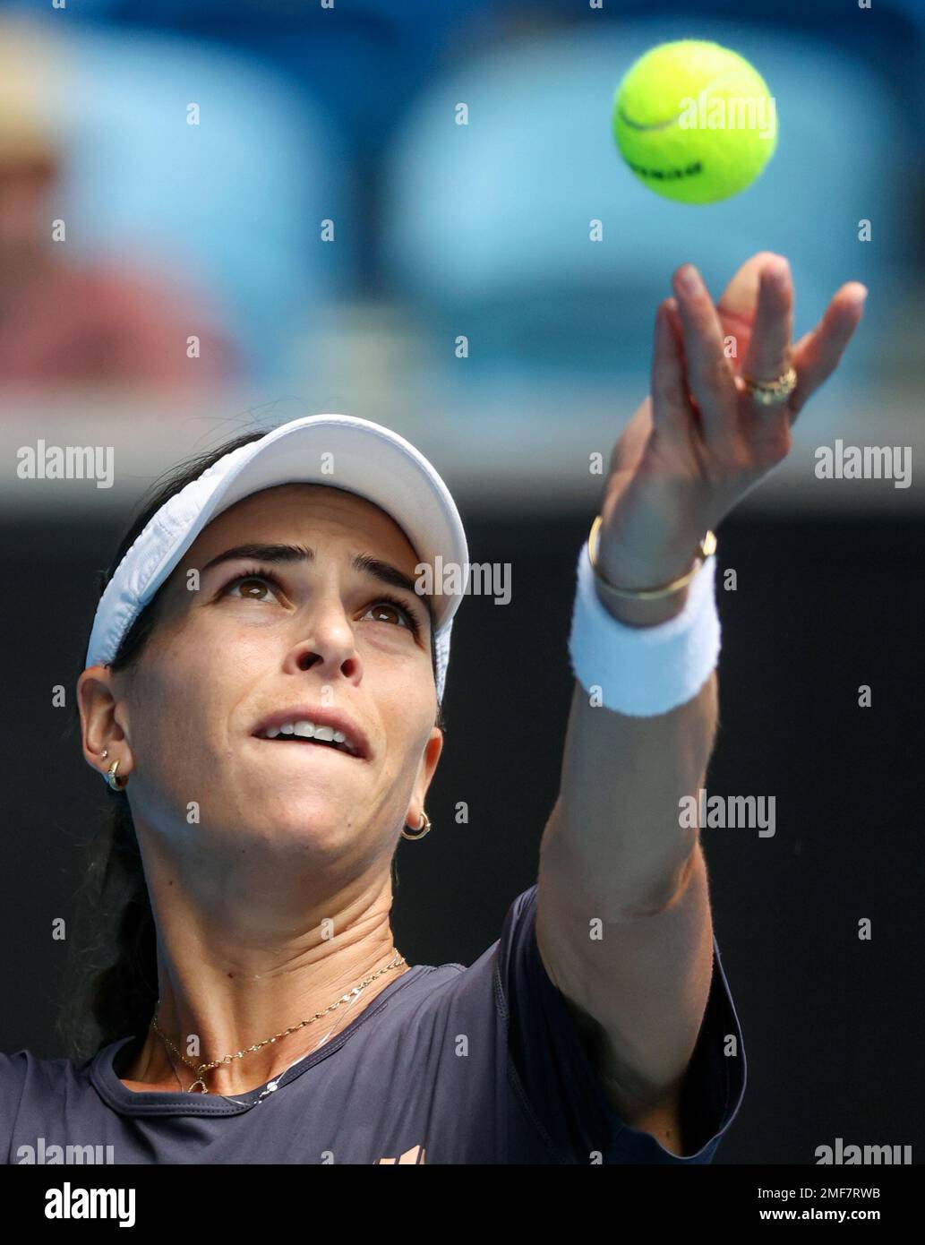 Australia's Ajla Tomljanovic serves to France's Alize during a