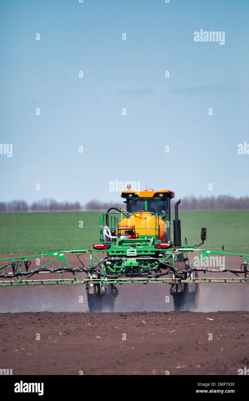 Soil treatment with drugs. Application of herbicides. pesticides or