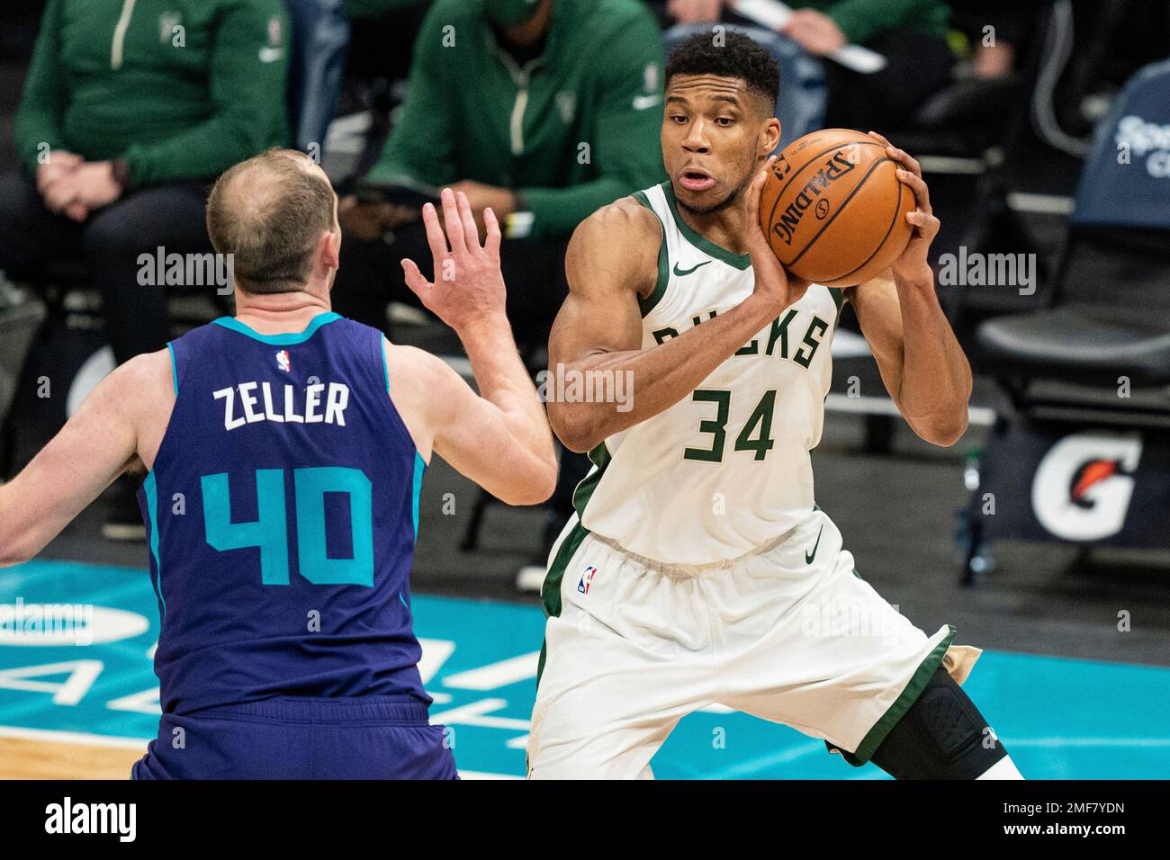 Milwaukee Bucks forward Giannis Antetokounmpo (34) is guarded by